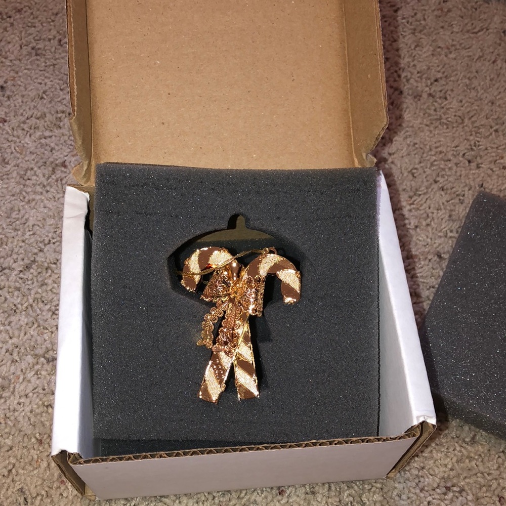 Festive Candy Cane gold ornament